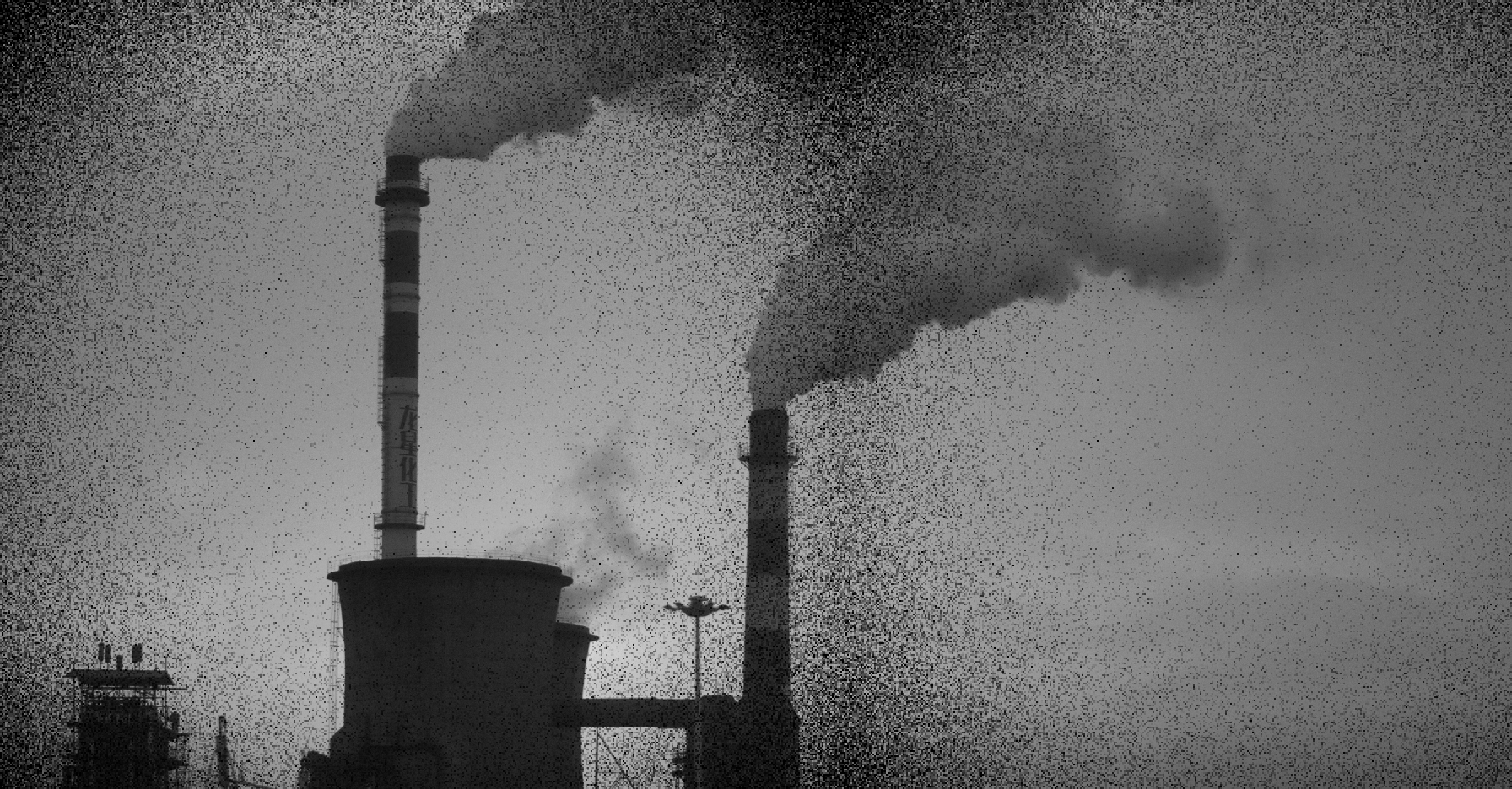 Factory chimneys releasing harmful greenhouse gases